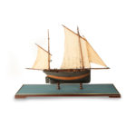 A gaff-rigged Hastings lugger side