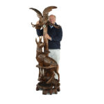 An unusual ‘Black Forest’ walnut eagle and chamois hall stand with Charlie