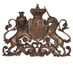 A Victorian carved oak Royal Coat of Arms,