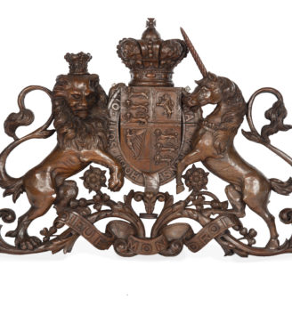 A Victorian carved oak Royal Coat of Arms,