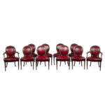 A set of ten Victorian mahogany dining chairs in the style of Hepplewhite