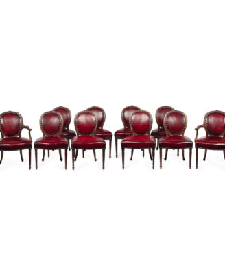 A set of ten Victorian mahogany dining chairs in the style of Hepplewhite