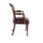 A set of ten Victorian mahogany dining chairs carver side