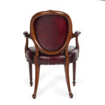 A set of ten Victorian mahogany dining chairs carver back