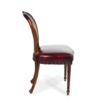 A set of ten Victorian mahogany dining chair leg side profile