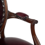 A set of ten Victorian mahogany dining chair arm