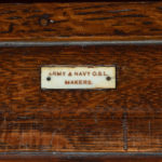 Late Victorian oak gun cabinet detail