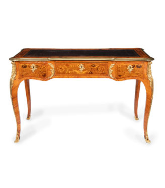 A Victorian kingwood marquetry writing table in the French taste