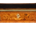 A Victorian kingwood marquetry writing table details