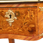 A Victorian kingwood marquetry writing table details