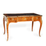 A Victorian kingwood marquetry writing table