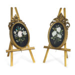 Two very similar pietra dura and ormolu photograph frames on easels main