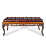 A long early Victorian rosewood stool