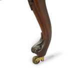 An early Victorian rosewood stool leg