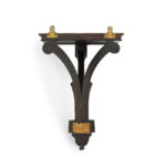 A late Victorian mahogany wall bracket for a clock, by Edwards and Roberts back