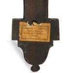 A late Victorian mahogany wall bracket for a clock, by Edwards