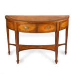 An unusual George III satinwood side table,