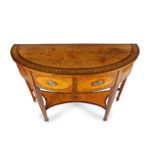 An unusual George III satinwood side table details top