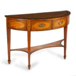 An unusual George III satinwood side table