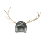 A large metal helmet with applied stag antlers by Martin Scorey