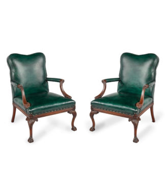 A pair of mahogany open armchairs in the style of Chippendale