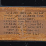 A papier mâché tray of the Battle of Erie by Jennens & Bettridge label detail