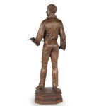 An attractive walnut model of fencer back