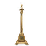 A Regency brass triple column table lamp