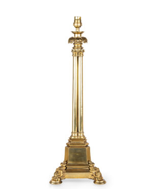 A Regency brass triple column table lamp