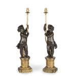 A pair of Napoleon III bronze and ormolu table lamps