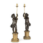 A pair of Napoleon III bronze and ormolu table lamps