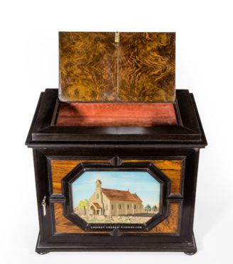 An unusual ebony bijouterie table cabinet showing Calvary Church, Stonington