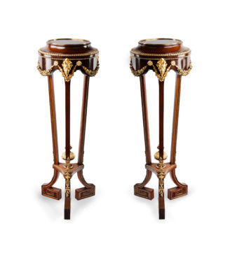 A pair of mahogany and gilt metal jardinières/torchères