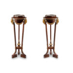 A pair of mahogany and gilt metal jardinières/torchères