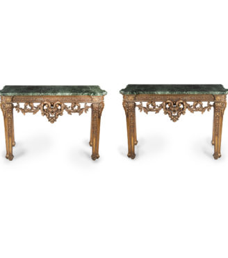 A pair of late Victorian marble and giltwood console tables in the manner of William Kent and Benjamin Goodison