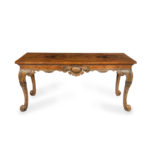 A finely carved walnut side table in the George II style by the Harry Meyers Company of New York and Chicago