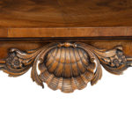 A finely carved walnut side table in the George II style by the Harry Meyers Company