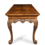 A finely carved walnut side table in the George II style by the Harry Meyers Company side